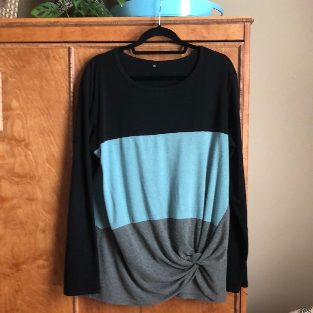 long sleeve tri-colored shirt.